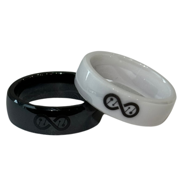 Black and white ceramic Infinity ring.